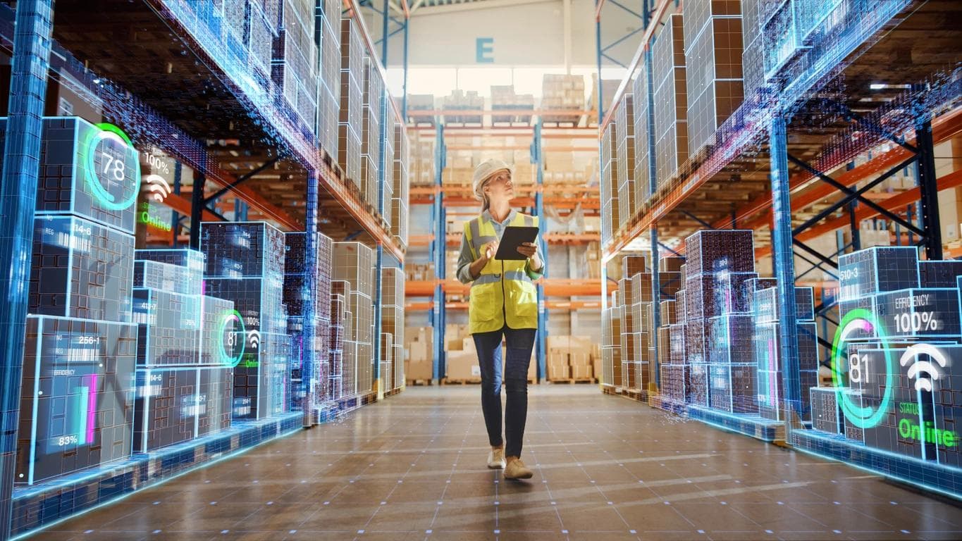 person walking with clipboard in warehouse