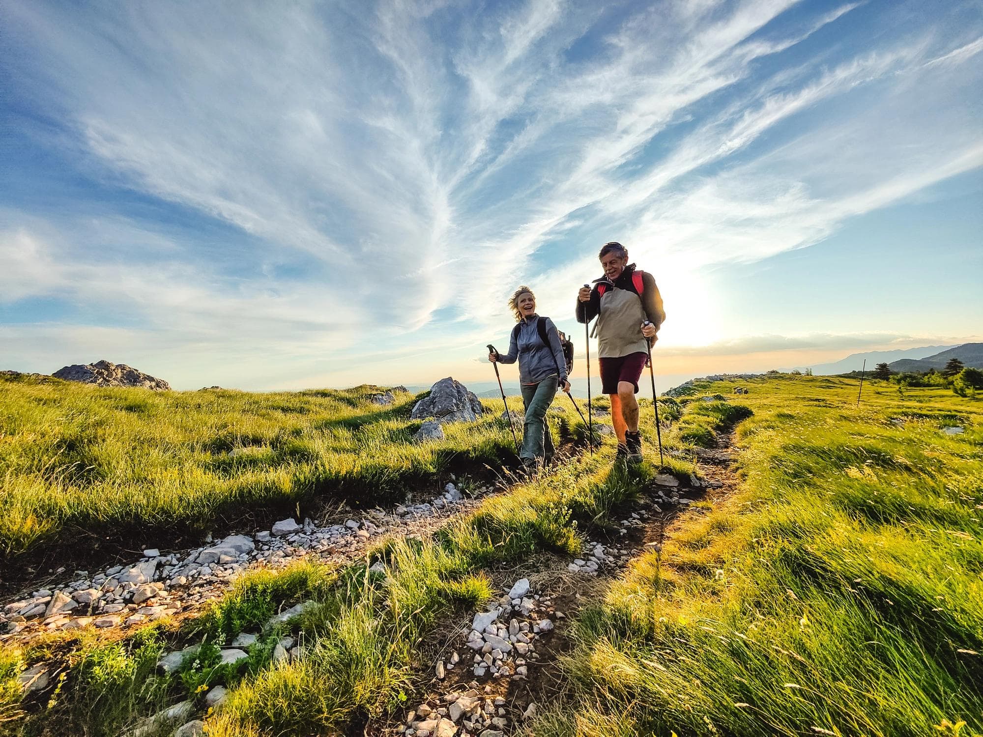 Two Content Seniors Hiking and Walking Off The Beaten Path