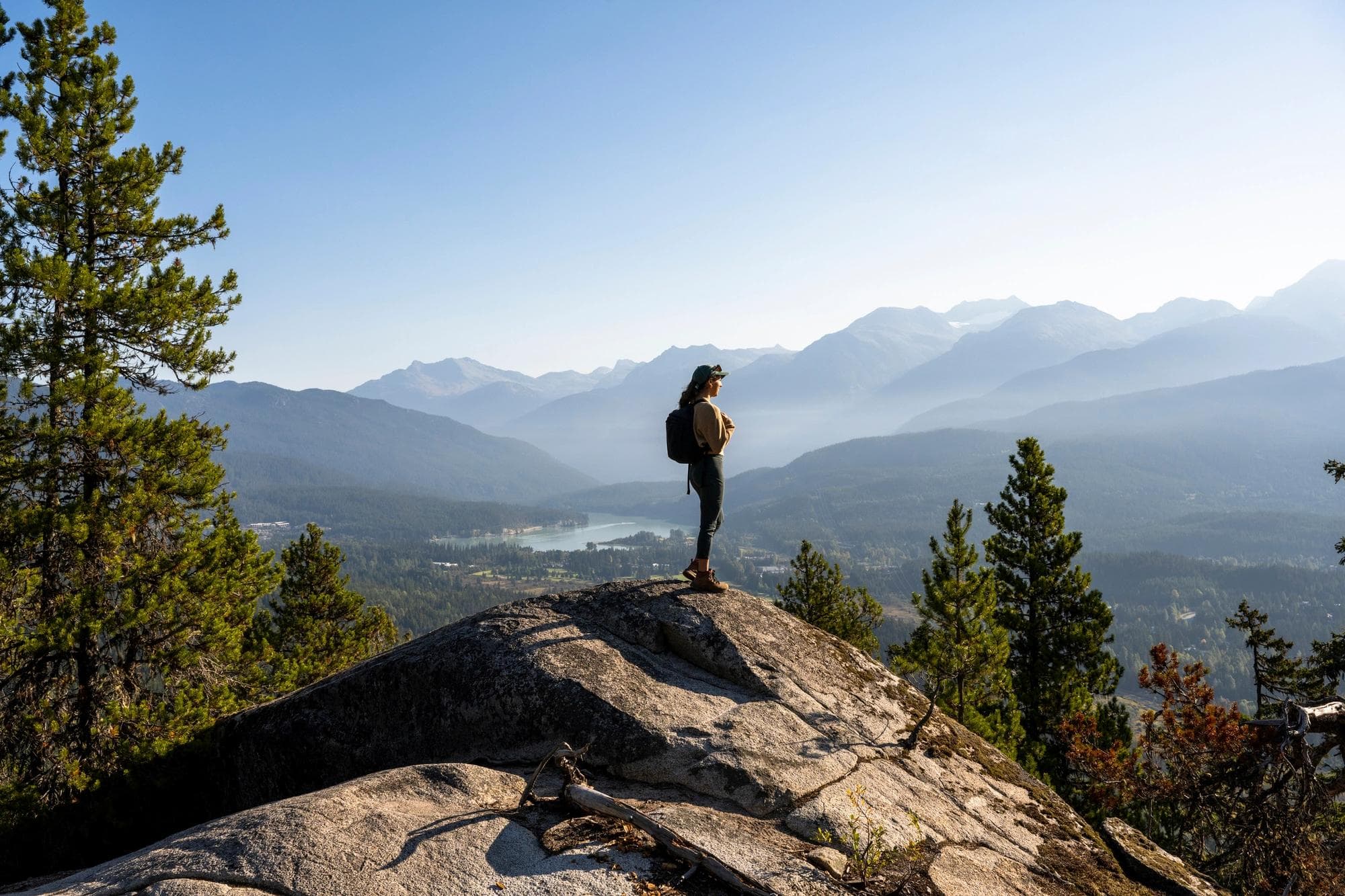 Solo female spending time in nature in nature. Hiking in Whistler, BC, Canada.