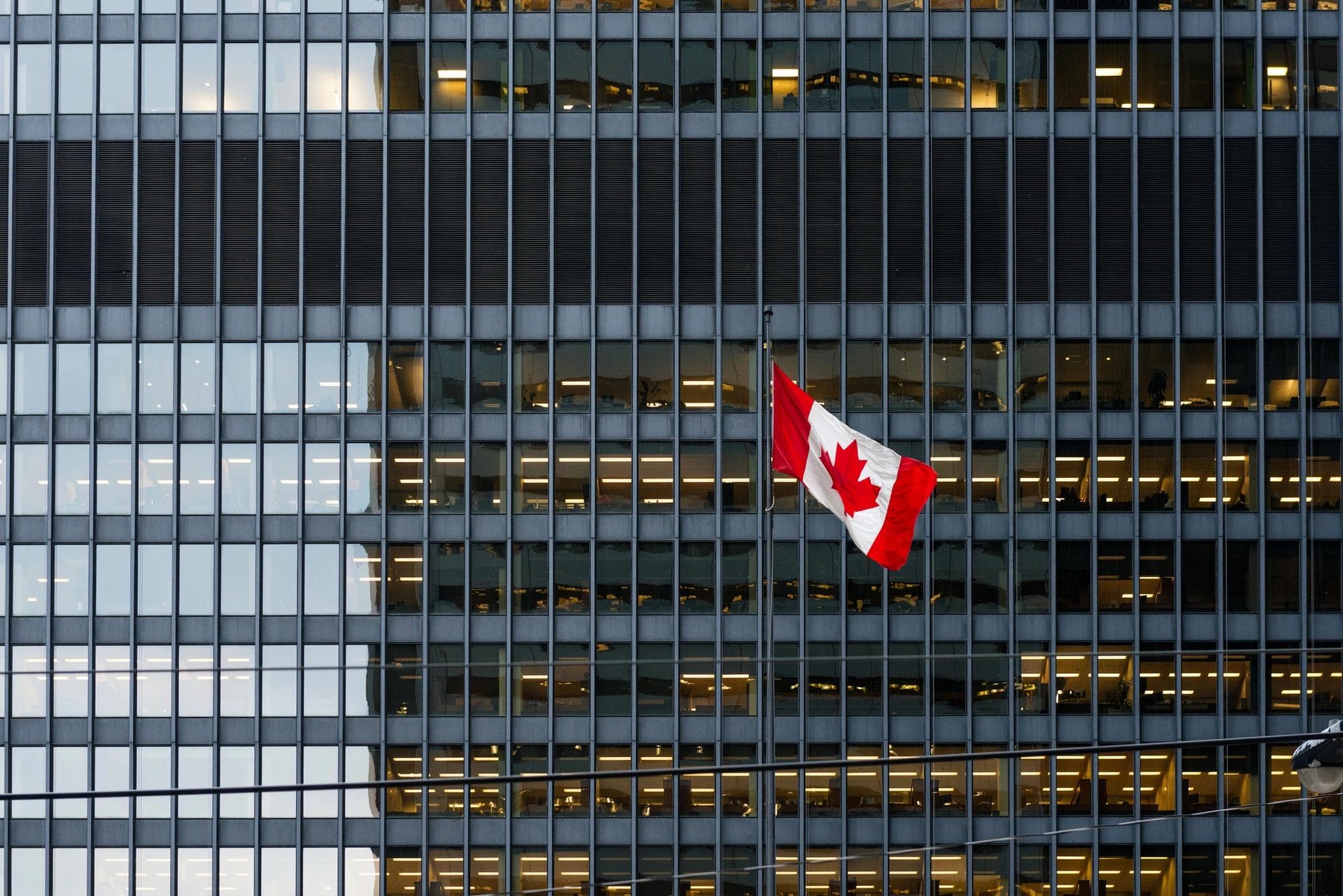 office building with canadian flag