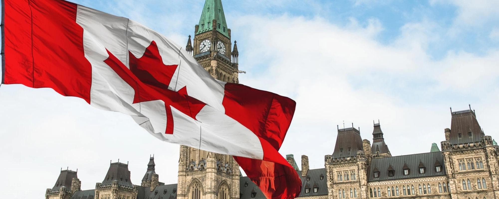 Parliament buildings in ottawa ontario with Canada flag