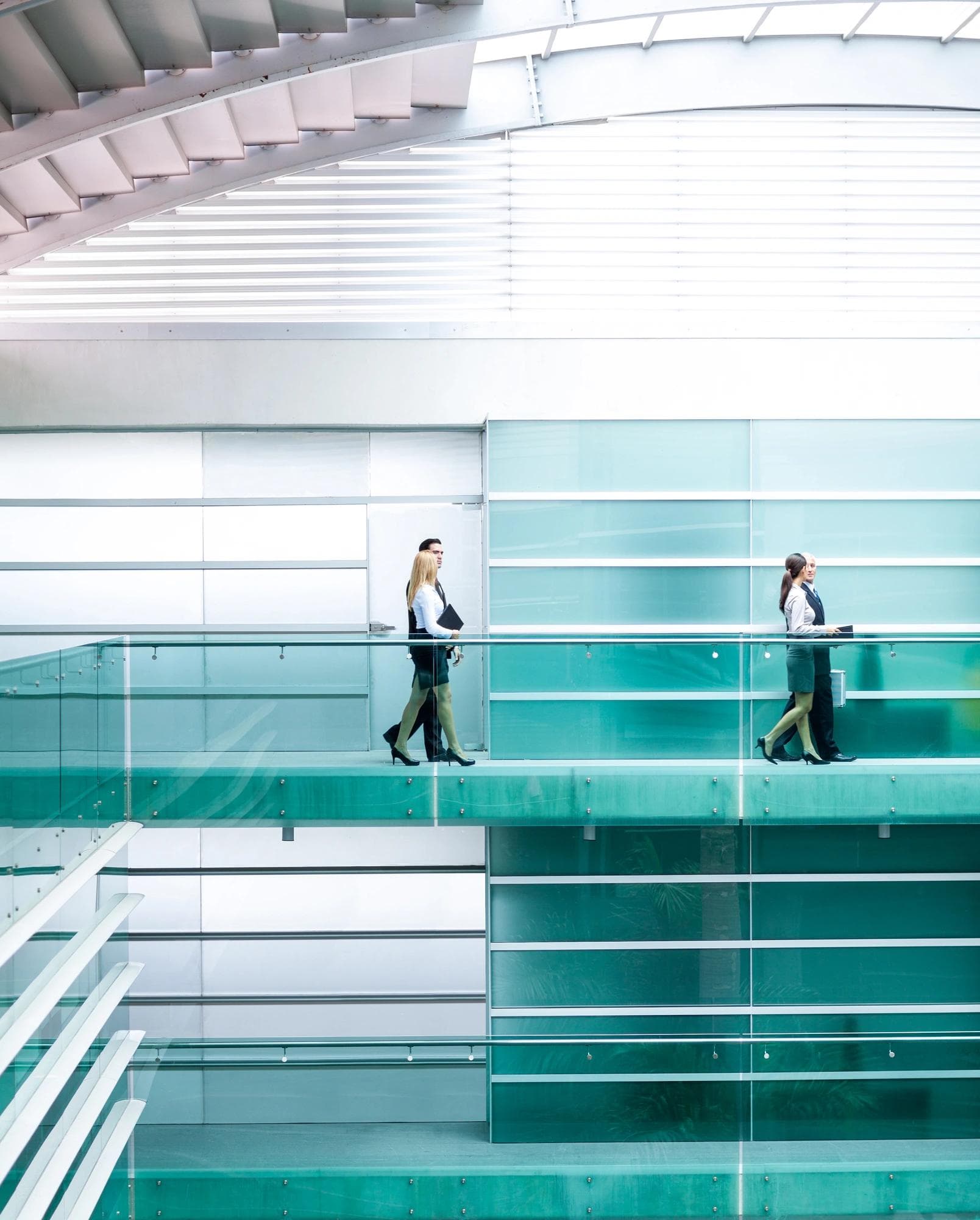 people walking in office building