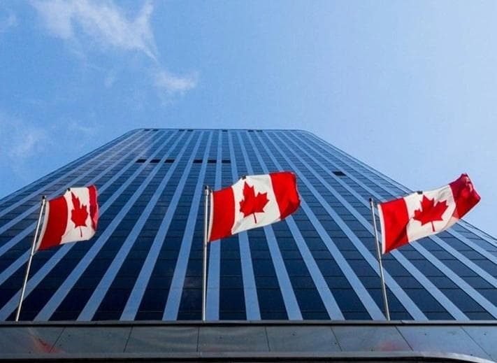 office building with canadian flags