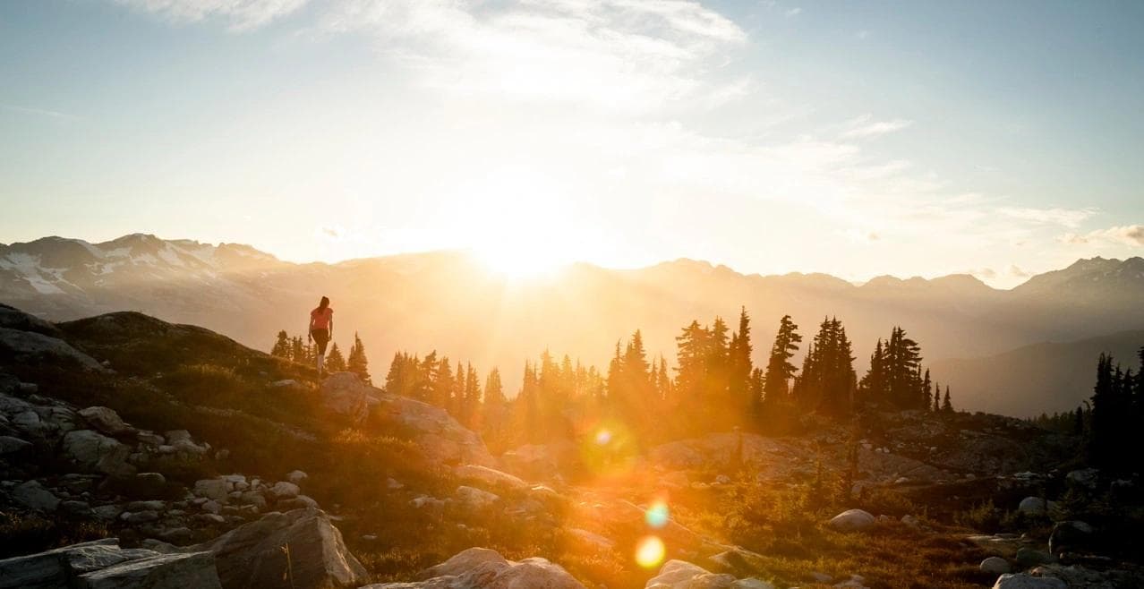 person hiking in the mountains